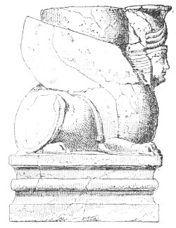 Fig. 85.—Winged Sphinx carrying the base of a column; from
Layard.