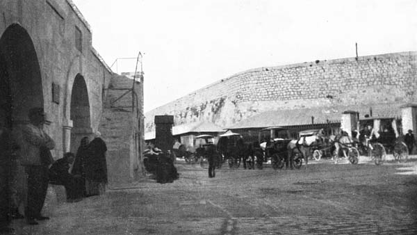 WALLS OF GREAT THICKNESS AND A TUNNEL-LIKE ENTRANCE.